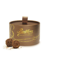 Продуктови Категории Шоколади Butlers Трюфели от млечен шоколад , покрити с люспи от млечен шоколад 200 гр